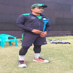 Sunil Joshi with Leverage RoboArm ball thrower
